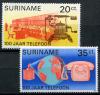 Почтовые марки. Суринам. 1976. Столетие телефона. Космос. № 730-731. 1976г